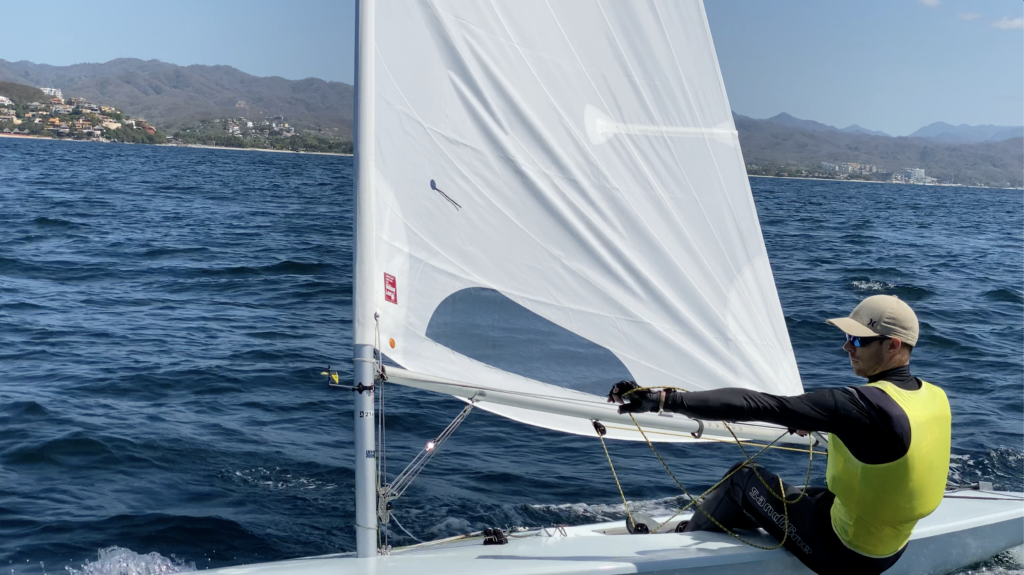 Clearing the mainsheet after a tacking in a Laser ILCA dinghy